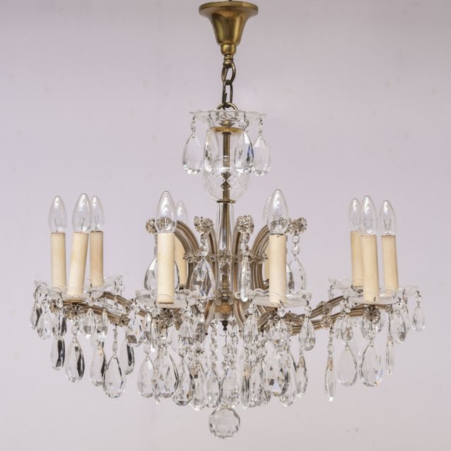Verkocht artikelnr. 001124 - 10 Lichts Kristallen 'Maria Theresia' Kroonluchter 1920
antiek model

Doorsnede: 60cm

hoogte zonder ketting: 60cm
Keywords: 10 Lichts Kristallen &#039;Maria Theresia&#039; Kroonluchter 1920
